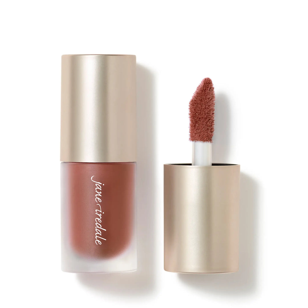 ColorLuxe Liquid Blush soldier with applicator and visible brand name on bottle, on a white background