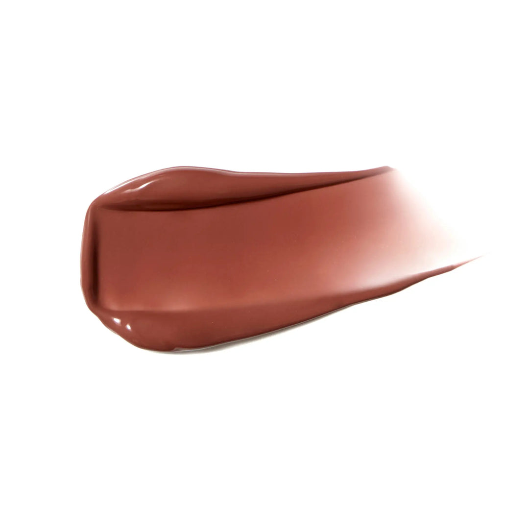 Soft bronze terra cotta coloured liquid blush swatch on white background