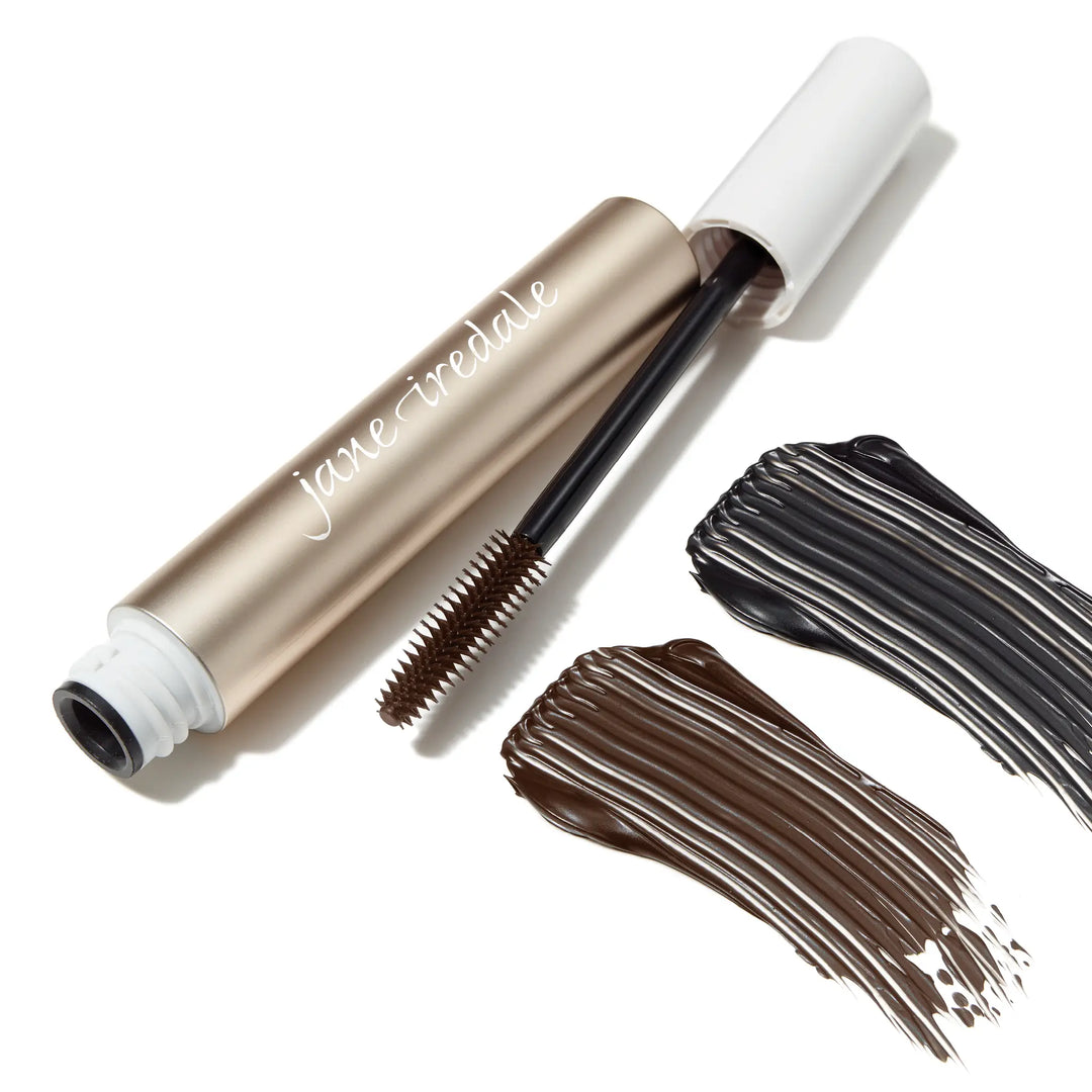 Lash Fixation bottle and wand applicator with black and brown colour swatches on a white background
