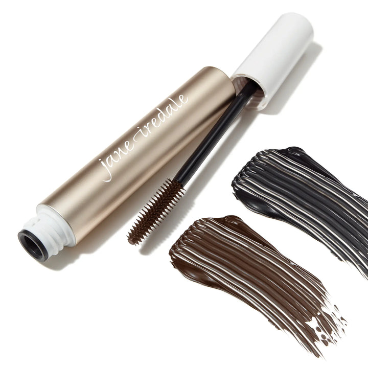 Lash Fixation bottle and wand applicator with black and brown colour swatches on a white background