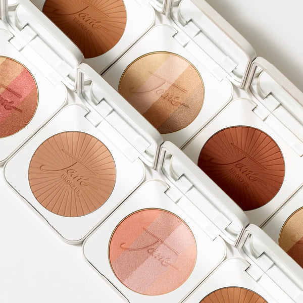 Jane Iredale PureBronze Shimmer and Matte Bronzing Powder refills sitting in compacts - available as a makeup bundle