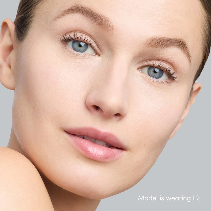 Model wearing L2 - close-up of model wearing Jane Iredale Skintuition Brightening Under Eye Concealer in shade L2.