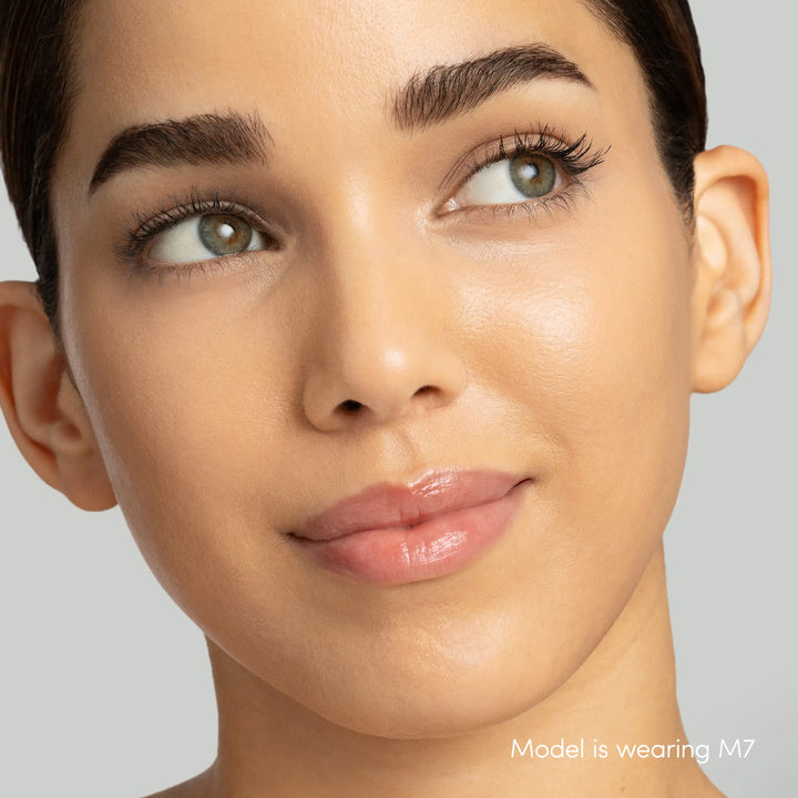 Model wearing M7 - close-up of model wearing Jane Iredale Skintuition Brightening Under Eye Concealer in shade M7.