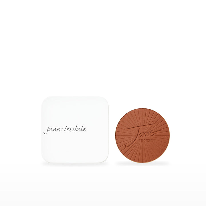 PureBronze Matte Bronzer Refill &amp; Refillable Compact Bundle. Dark – chocolate brown Ⓥ / White. Included products grouped on white.