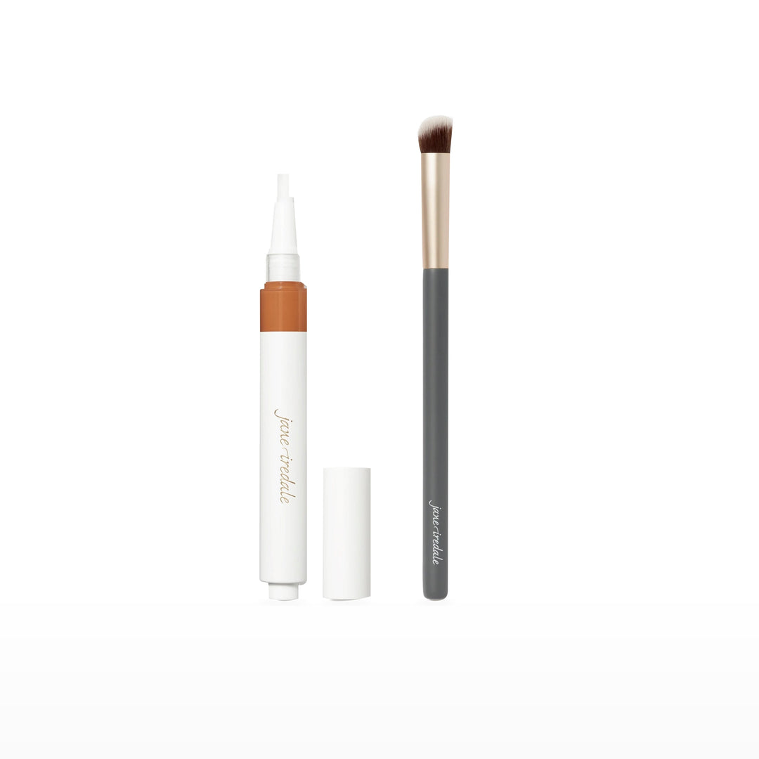 Skintuition Concealer &amp; Concealer Brush Bundle. D11 - dark with gold undertones. Included products grouped on white.